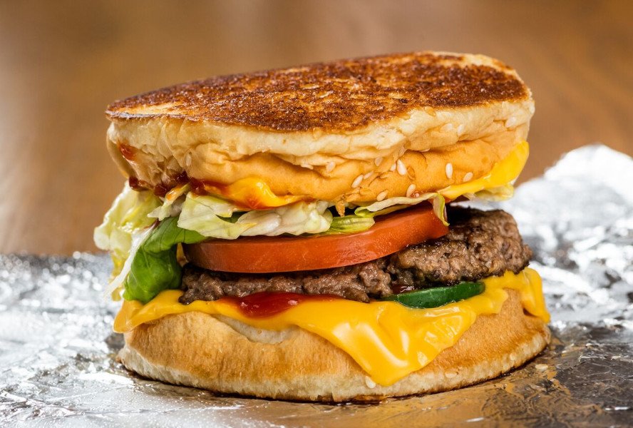 Five Guys Patty Melt with beef patty grilled onions and cheese on toast